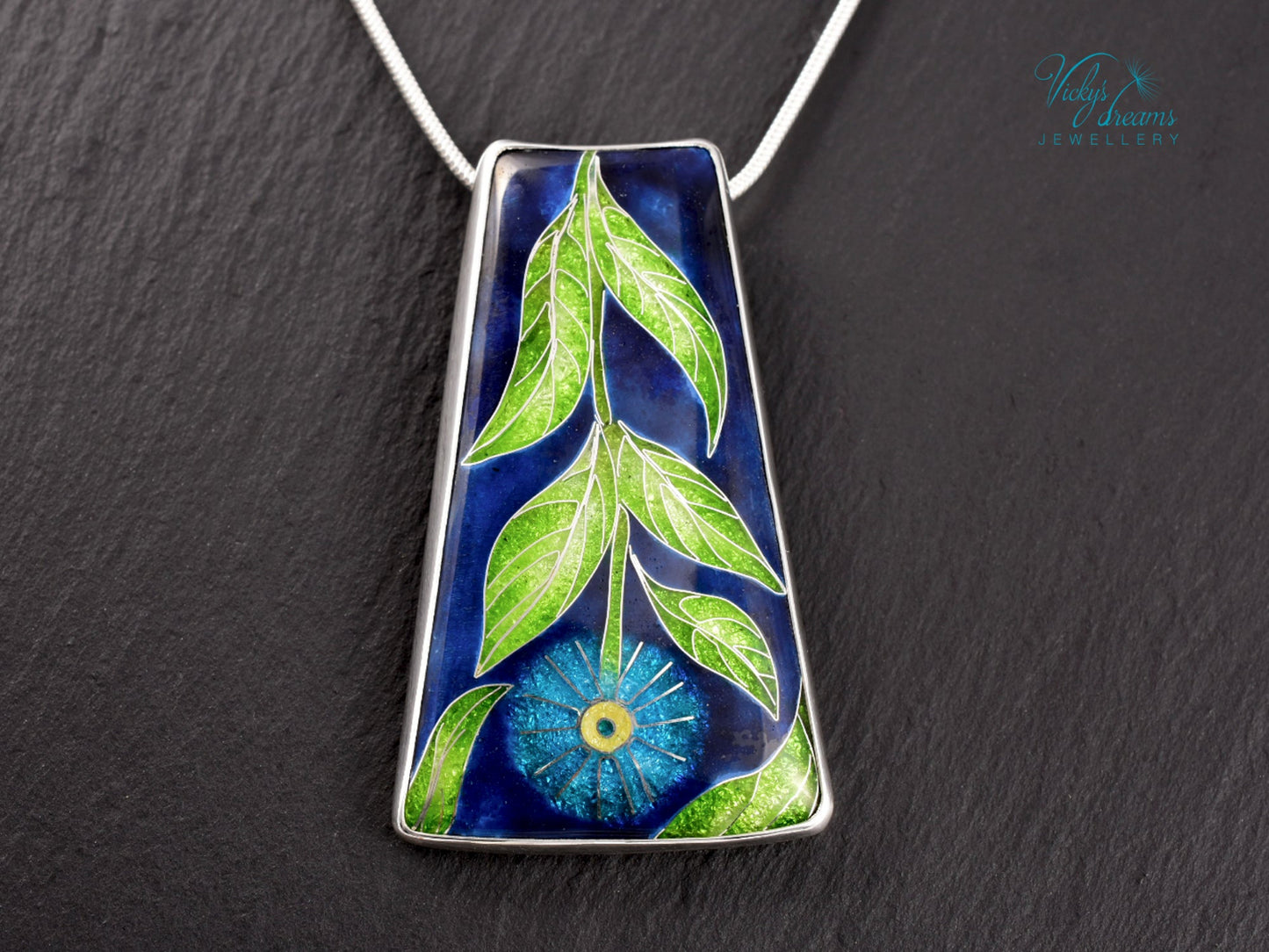 Handmade cloisonné enamel floral pendant on sterling silver necklace, vibrant botanical design
