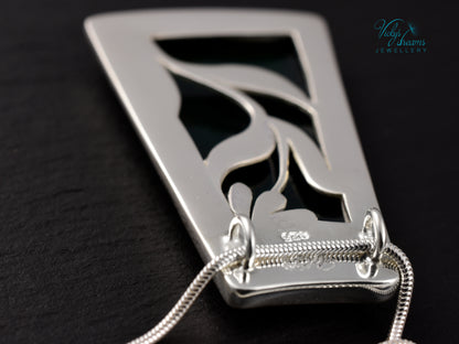 Handmade cloisonné enamel floral pendant on sterling silver necklace, vibrant botanical design