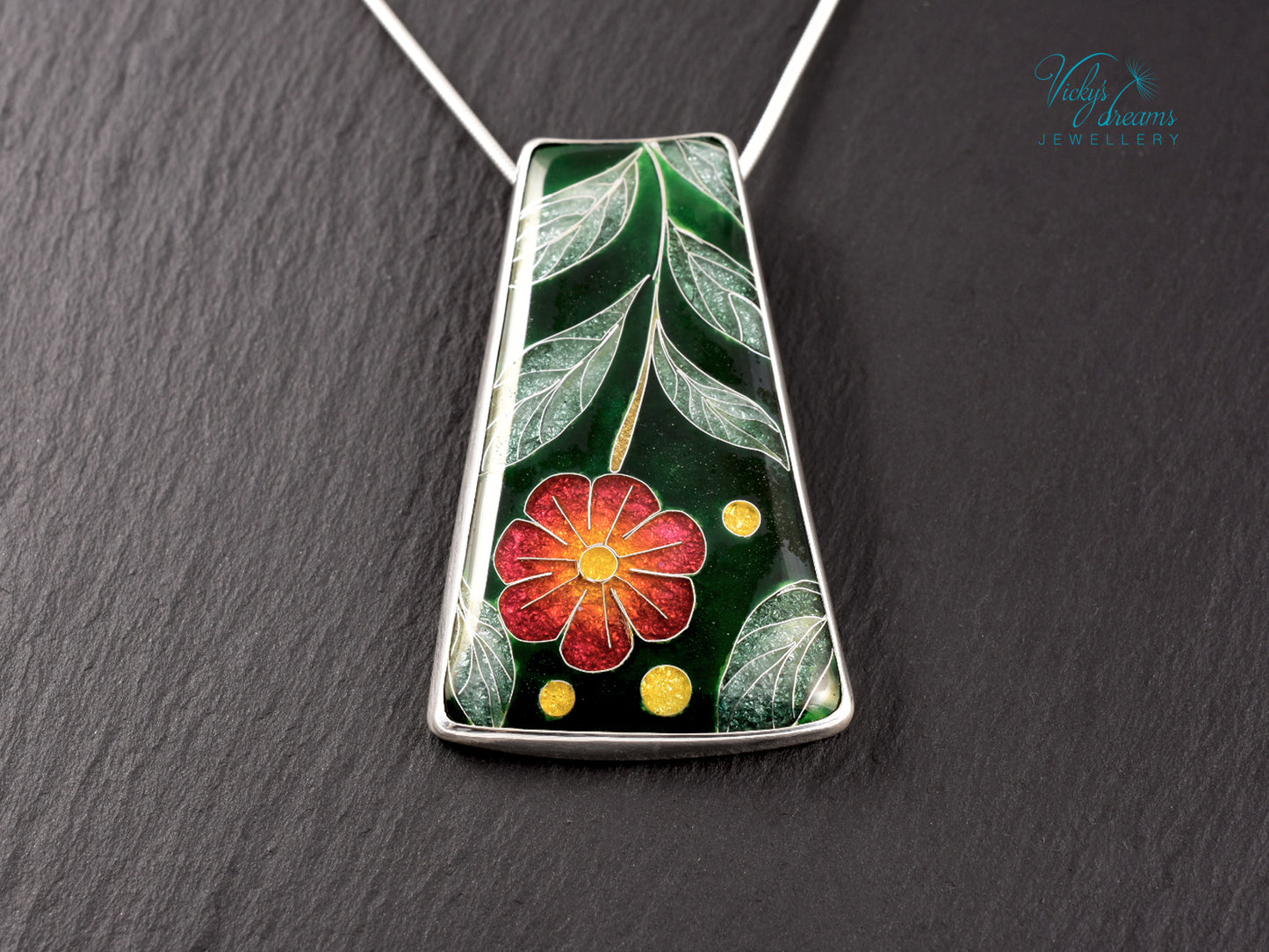 Handmade cloisonné enamel floral pendant on sterling silver necklace, vibrant botanical design