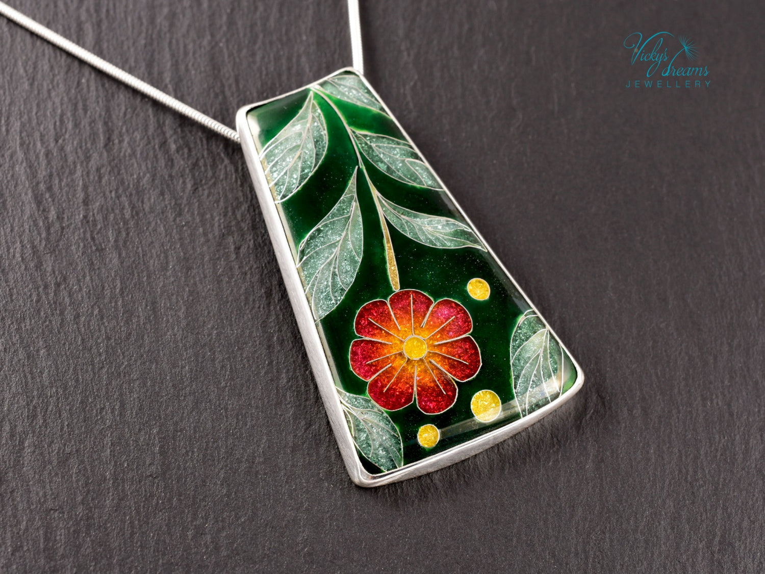 Handmade cloisonné enamel floral pendant on sterling silver necklace, vibrant botanical design