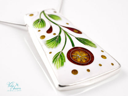 Handmade cloisonné enamel floral pendant on sterling silver necklace, vibrant botanical design