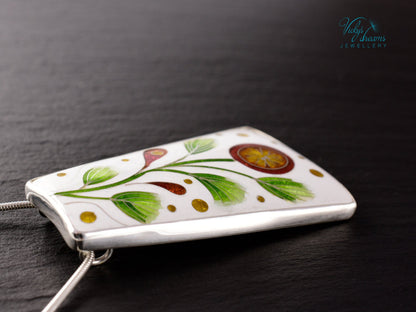 Handmade cloisonné enamel floral pendant on sterling silver necklace, vibrant botanical design