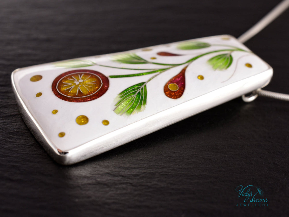 Handmade cloisonné enamel floral pendant on sterling silver necklace, vibrant botanical design