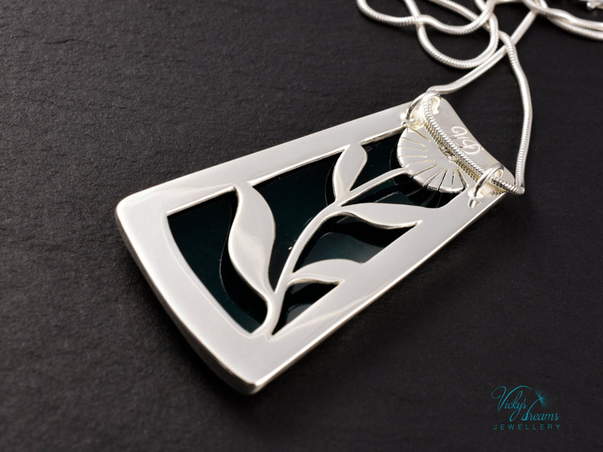 Handmade cloisonné enamel floral pendant on sterling silver necklace, vibrant botanical design