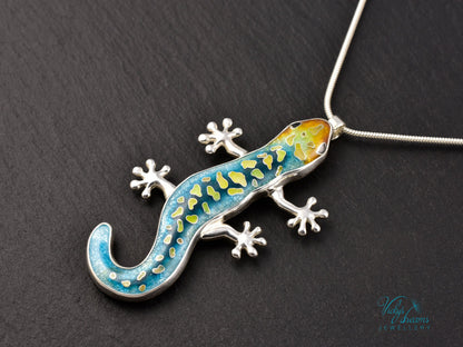 Handcrafted cloisonné enamel necklace with blue, yellow, and orange lizard design set in sterling silver.
