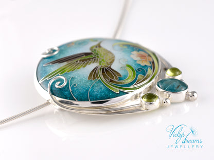 Handcrafted hummingbird pendant with cloisonné enamel and gemstone accents