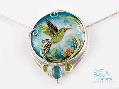 Handcrafted hummingbird pendant with cloisonné enamel and gemstone accents