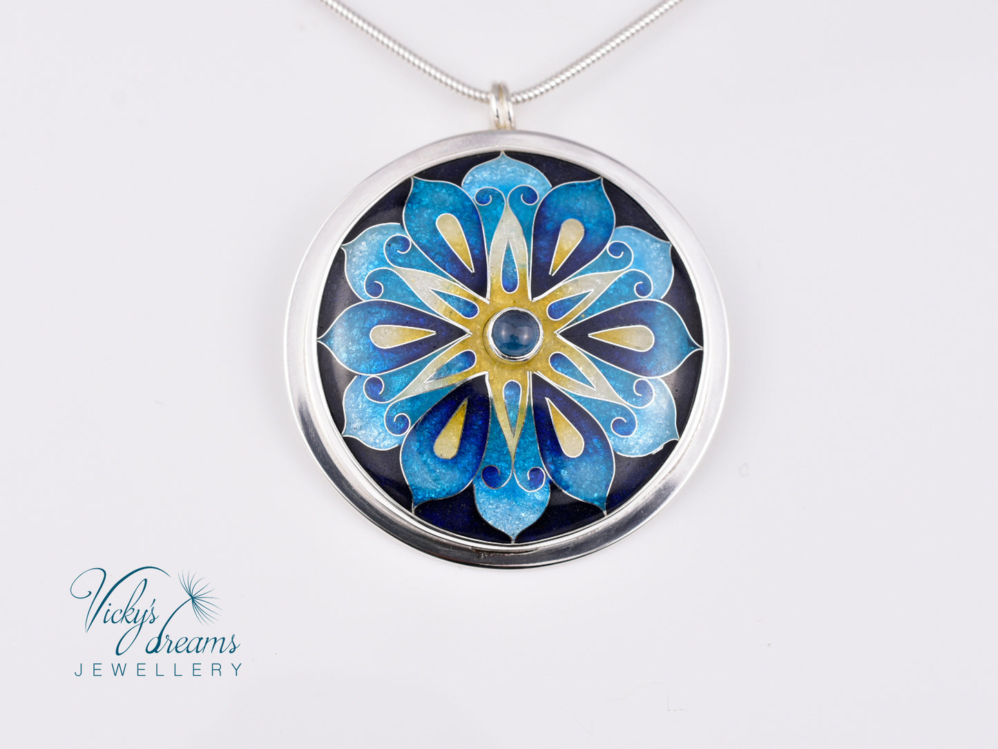 Handmade cloisonné blue mandala enamel pendant with London Blue Topaz gemstone in sterling silver