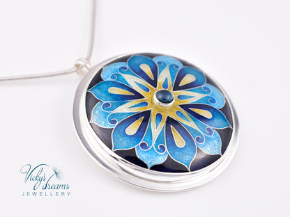 Handmade cloisonné blue mandala enamel pendant with London Blue Topaz gemstone in sterling silver