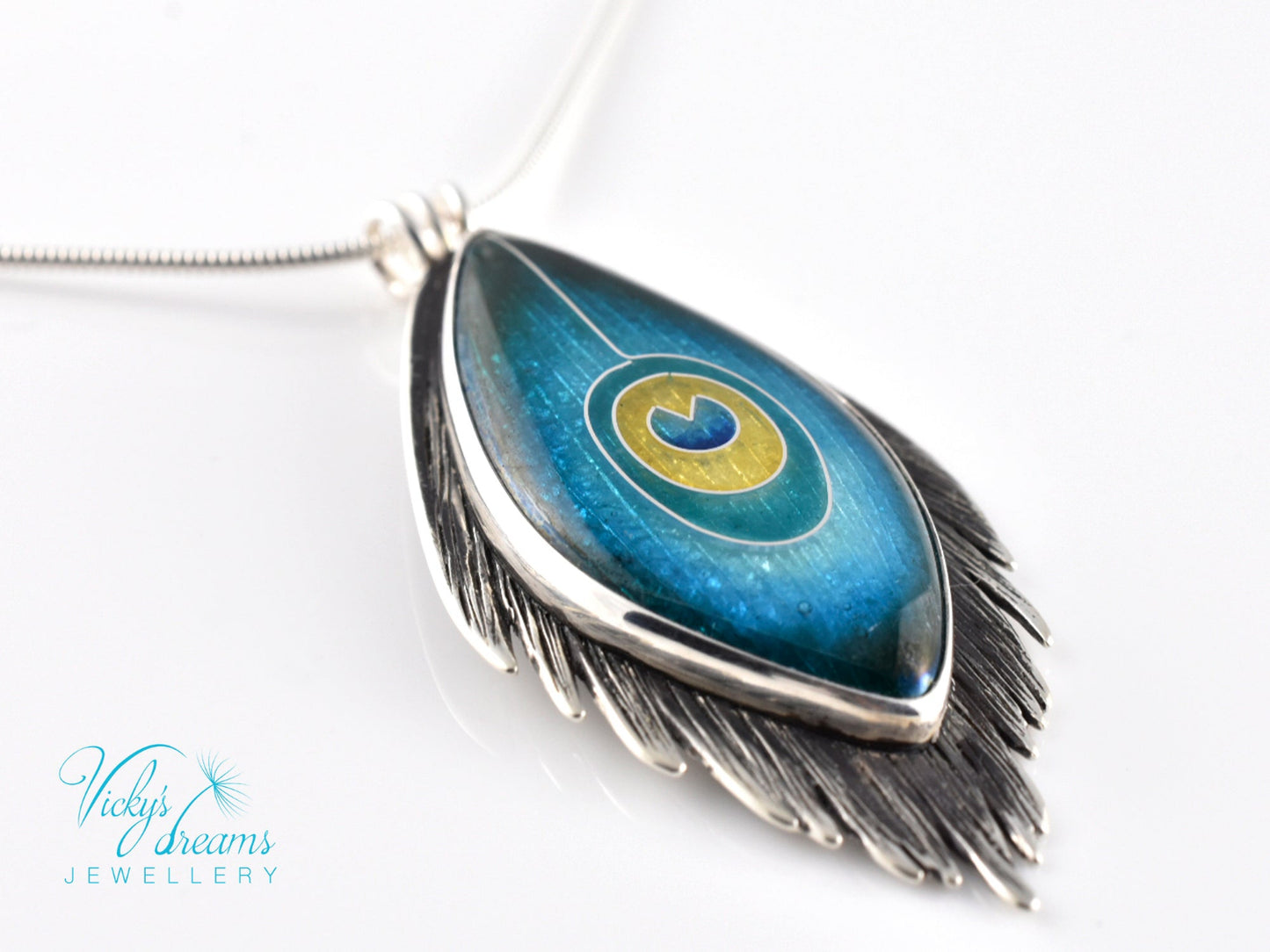 Handmade cloisonné enamel peacock feather pendant in oxidized sterling silver