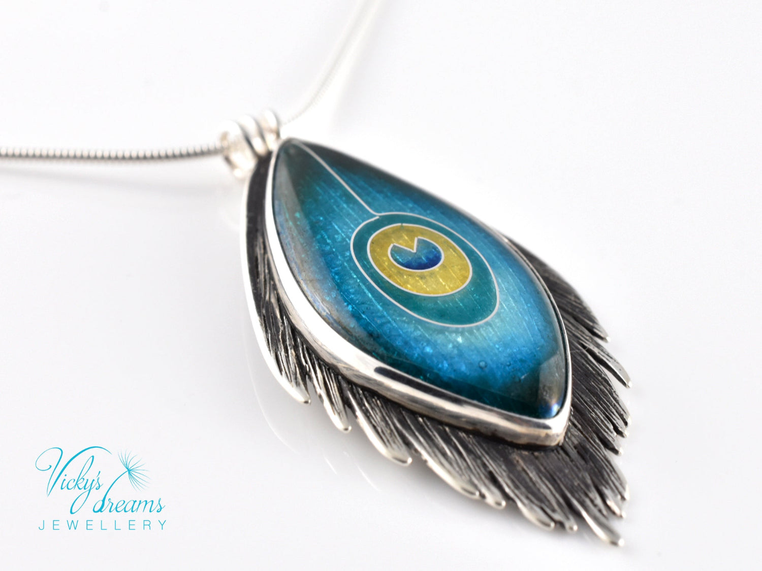 Handmade cloisonné enamel peacock feather pendant in oxidized sterling silver