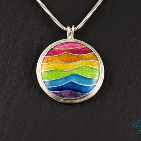 Handmade cloisonné enamel rainbow pendant in sterling silver, vibrant colors, pride jewelry
