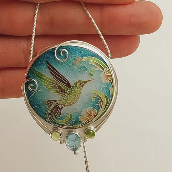 Handcrafted hummingbird pendant with cloisonné enamel and gemstone accents