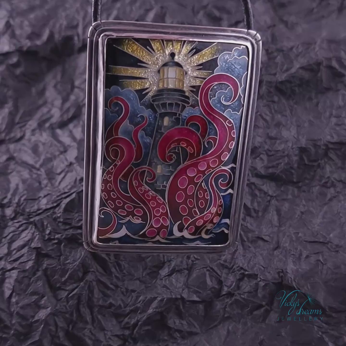 Lighthouse cloisonné enamel pendant with playful octopus on 