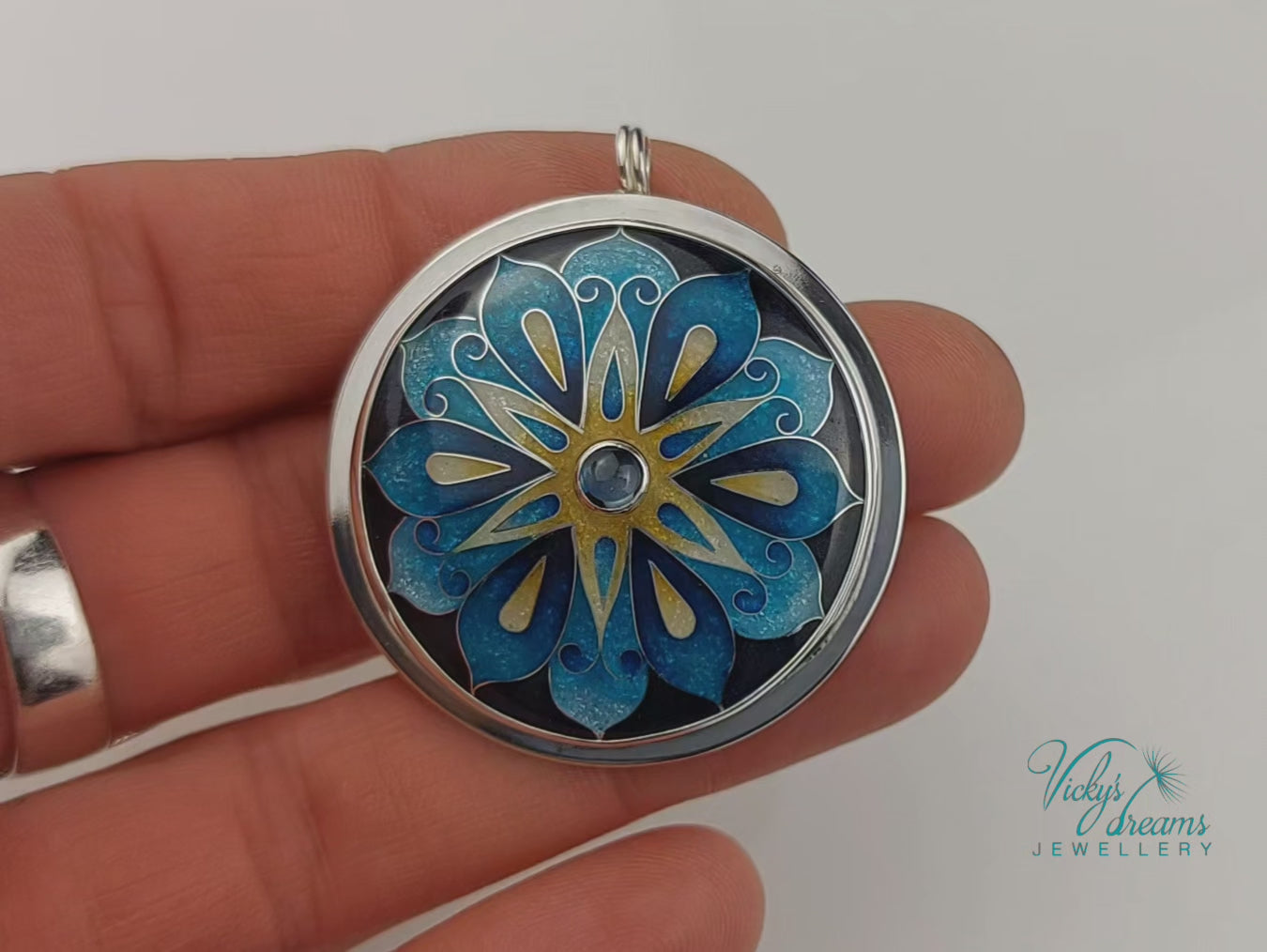 Handmade cloisonné blue mandala enamel pendant with London Blue Topaz gemstone in sterling silver