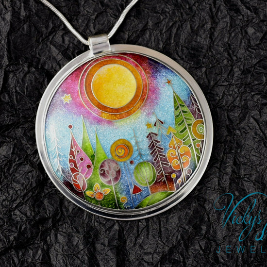 Handmade sterling silver cloisonné enamel pendant featuring a dreamlike forest with stylized trees, flowing lines, spiral motifs, and subtle stars