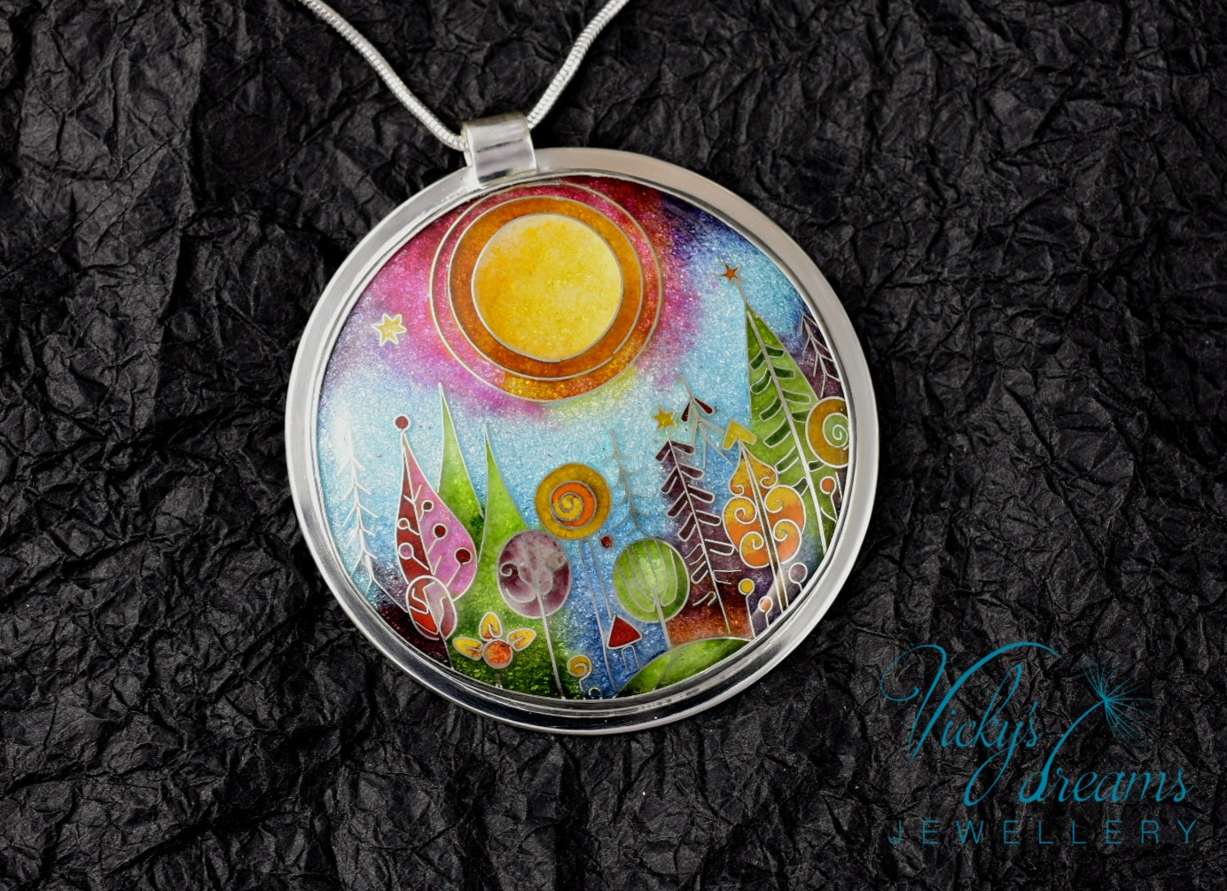 Handmade sterling silver cloisonné enamel pendant featuring a dreamlike forest with stylized trees, flowing lines, spiral motifs, and subtle stars