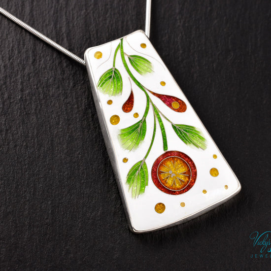 Handmade cloisonné enamel floral pendant on sterling silver necklace, vibrant botanical design