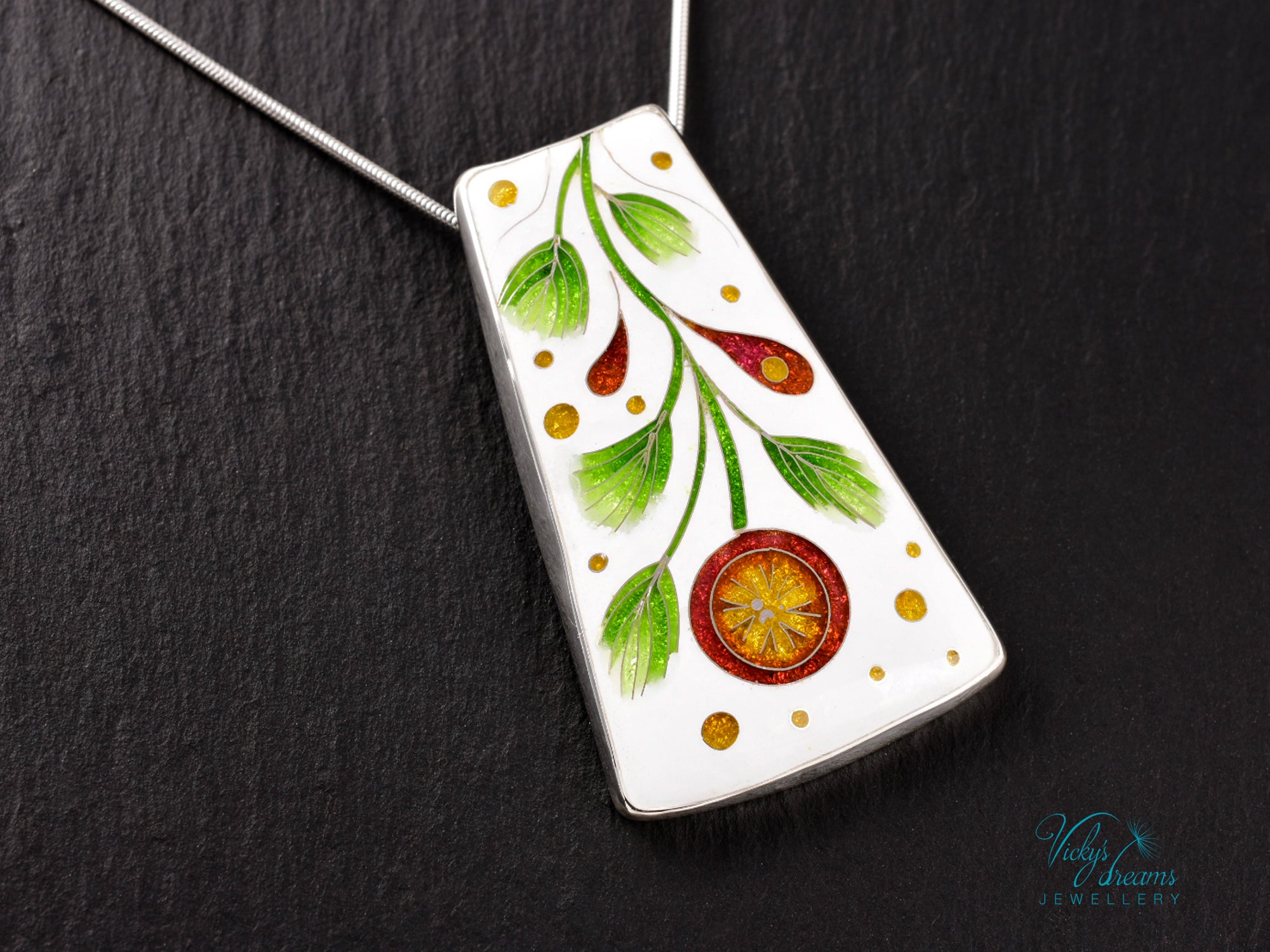 Handmade cloisonné enamel floral pendant on sterling silver necklace, vibrant botanical design