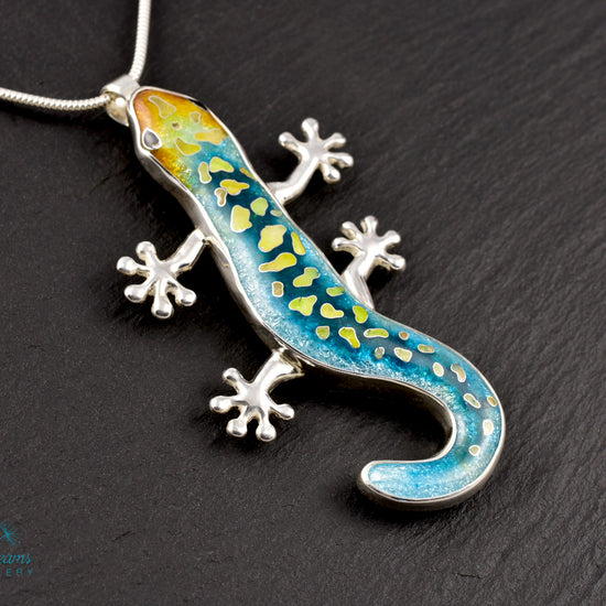 Handcrafted cloisonné enamel necklace with blue, yellow, and orange lizard design set in sterling silver.