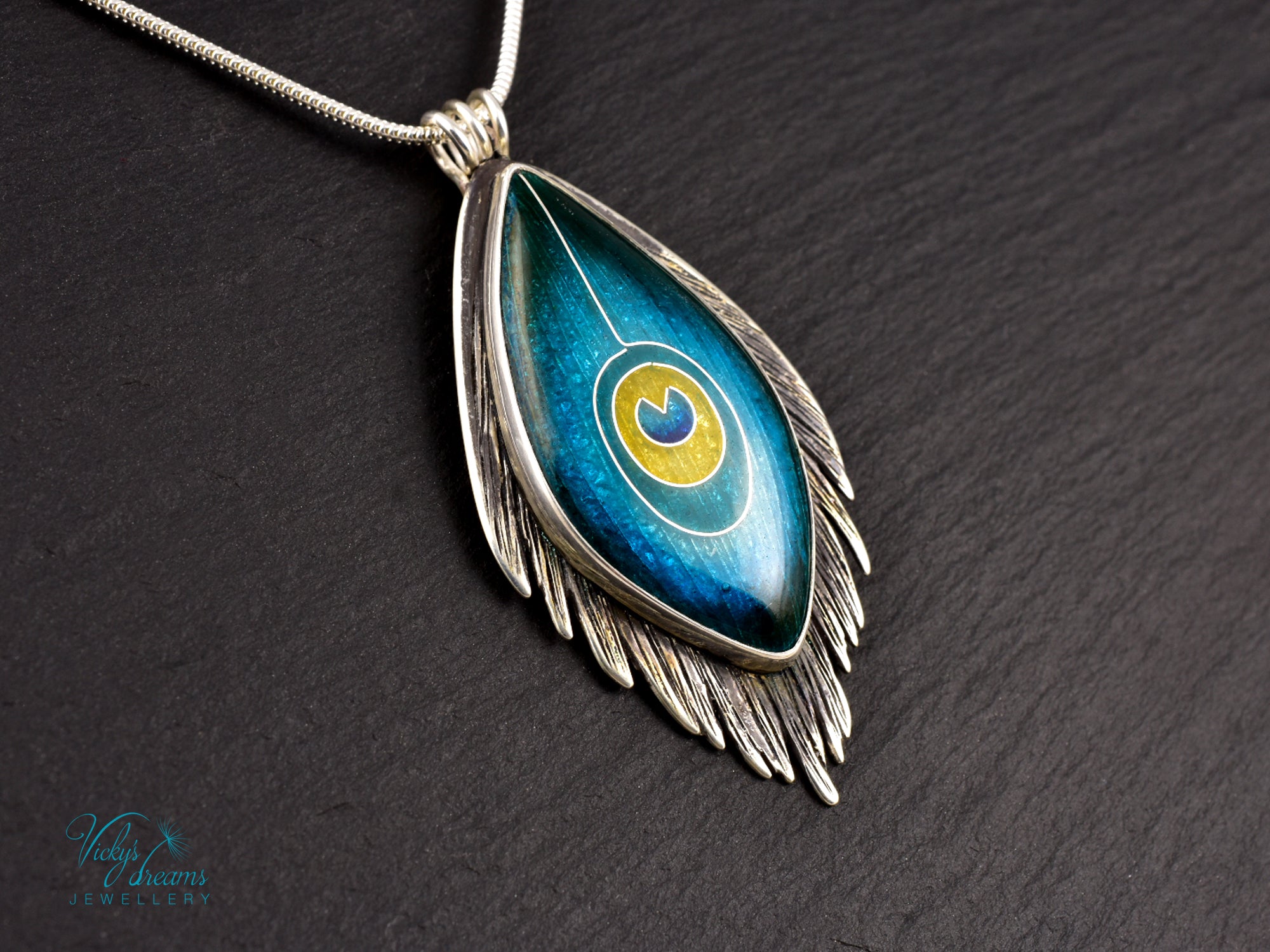 Handmade cloisonné enamel peacock feather pendant in oxidized sterling silver