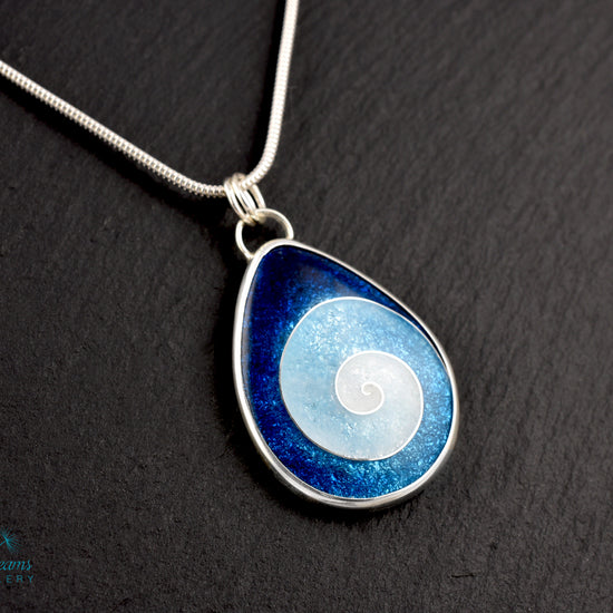 Handmade cloisonné enamel spiral pendant in blue and white, set in sterling silver