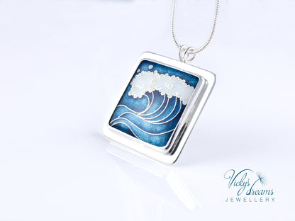 Cloisonné enamel necklace with blue and white sea wave design
