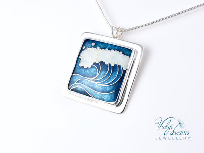 Cloisonné enamel necklace with blue and white sea wave design
