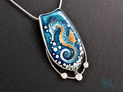 Handcrafted cloisonné seahorse pendant with vibrant enamel colors and rainbow moonstones