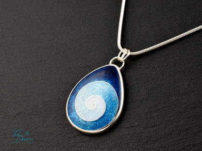 Handmade cloisonné enamel spiral pendant in blue and white, set in sterling silver