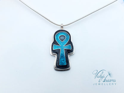 Handmade sterling silver Ankh pendant with colorful cloisonné enamel details.
