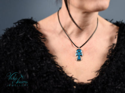 Handmade sterling silver Ankh pendant with colorful cloisonné enamel details.