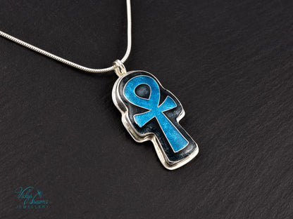 Handmade sterling silver Ankh pendant with colorful cloisonné enamel details.