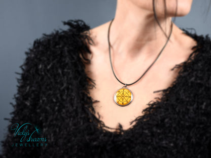 Hand painted enamel Wheel of Fortune tarot pendant in sterling silver and copper with leather cord